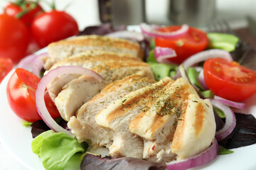 Tasty salad with grilled chicken, close up