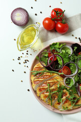 Concept of tasty eating with salad with grilled chicken on white background