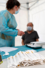 COVID-19 vaccination center.  Man receiving Covid 19 vaccination.   Saint-Gervais. France.