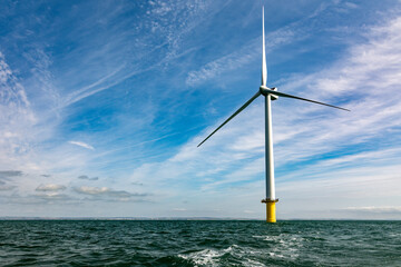 Offshore windfarm turbine and expanse of sea and sky