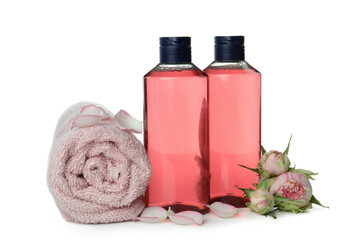 Obraz na płótnie Canvas Shower gels, towel and roses isolated on white background