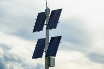 Solar panels on the background of clouds