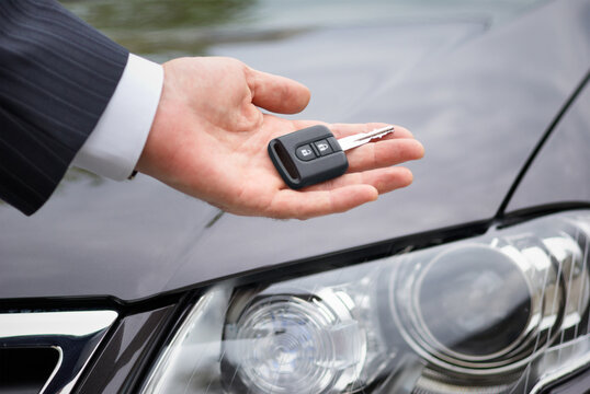 Car key in a hand of the Businessman