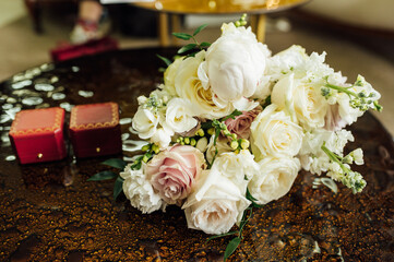 Bouquet of flowers of peonies and roses . Wedding bouquet of the bride.