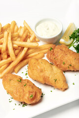 british traditional fish and chips meal on plate