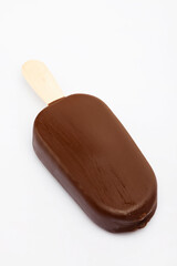 Ice-cream on stick, vanilla ice cream covered by chocolate