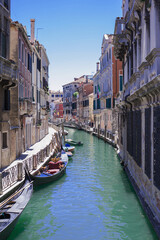 Obraz na płótnie Canvas romantic idyllic views of the narrow canal street and renaissance facades of the city of Venice