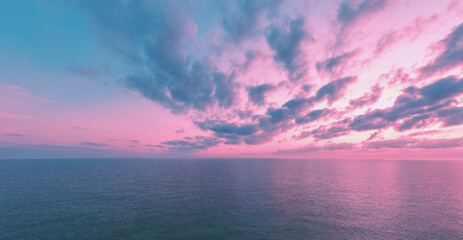 Seascape in the evening. Sunset over the sea with beautiful sky. Horizontal pano