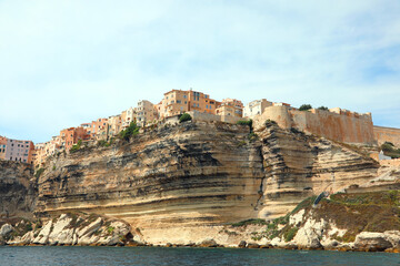 Houses of the town of Bonifacio in the French island Corsica built over the cliff