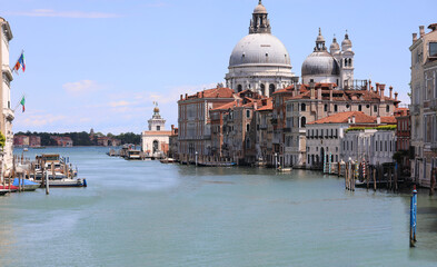 Fototapeta na wymiar Grand Canal in Venice without any boats during the lockdown and the great dome of the Church of the Madonna della Salute