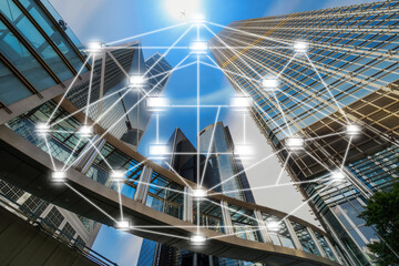 Block chain Text and Distributed computer network icon over Modern business building glass of skyscrapers with sun carona and airplane, Distributed ledger technology and block chain concept