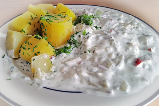 Cooking At Home And Ready To Eat, Potatoes With Pickled Herring In Sour Sauce