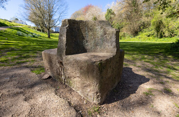Four-sided stone seat half way up the Castle Dell was erected for Queen Victoria's Jubilee. Chepstow, Monmouthshire, Wales