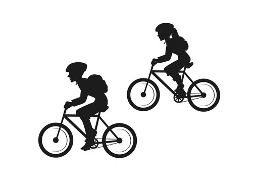 Man and woman travelers with backpacks riding mountain bikes silhouettes