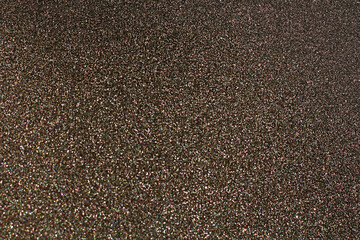 Brown glitter bokeh circle glow blurred and blur abstract. Glittering shimmer bright luxury . White and silver glisten twinkle for texture wallpaper and background backdrop.
