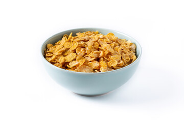 Corn flakes in a blue bowl isolated on white background