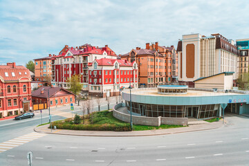 Naklejka na ściany i meble Streets of Kazan, panoramic view of the city on a summer day, buildings and architecture of the city. Kazan, Russia - 8 May 2021