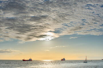 Fototapeta na wymiar boats in the sea at sunset