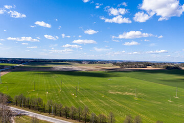 Fototapeta na wymiar Aerial view of agricultural landscape with fields in spring season.