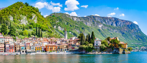 If you travel from Lugano to Lake Como the first village that you find is Menagio.. There you can take the ferry to Varenna.