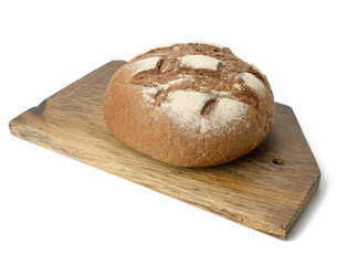 round baked rye flour bread isolated on white background