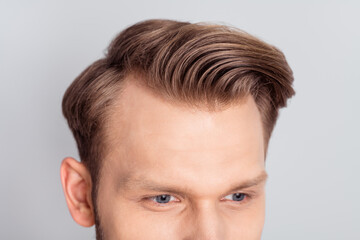 Obraz premium Cropped photo of young blond hairdo guy isolated on grey color background