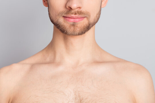 Photo of pretty charming young guy neck no clothes smiling isolated grey color background