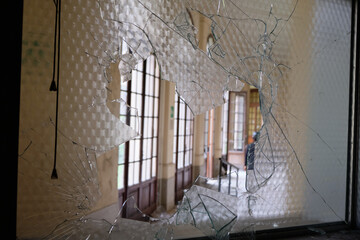broken window in a abandoned hospital. Interior architecture of old building