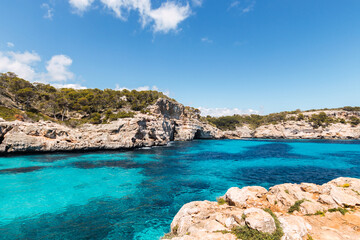 calo des moro, turquoise water from a cliff. mallorca, spain