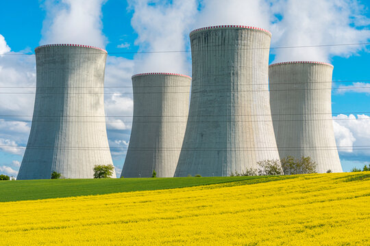 Nuclear power station. Cooling towers of a nuclear power plant in beautiful summer landscape. Nuclear power station Dukovany.