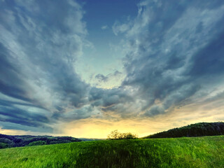 Obraz premium nice summer sunset in HDR with sky and clouds