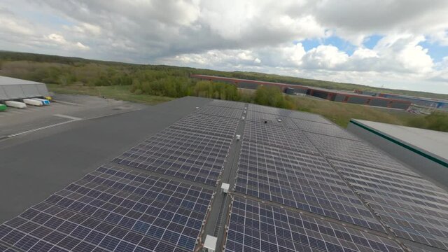 Flight footage of an FPV drone over a sola panel park