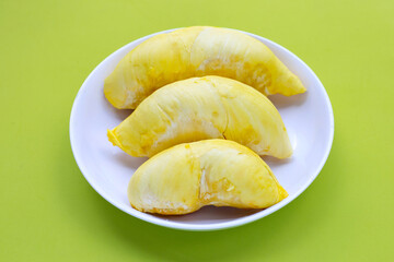 Fresh ripe durian in white plate on white