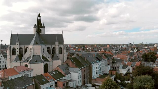 Church of Our Lady across the river Dijle, Mechelen, Belgium.  Aerial forward 