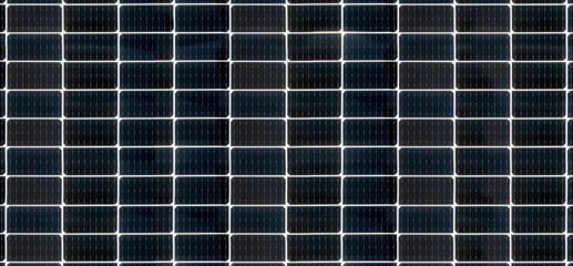 Large Solar power panel photographed from below, the light shines through. Sustainable energy