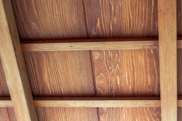 Wooden beams in a ceiling of a gazebo in the japanese garden