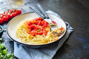 spaghetti tomato sauce pasta bolognese sauce vegetables salsa italian cuisine classic recipe on the table healthy food meal snack copy space food background rustic. top view