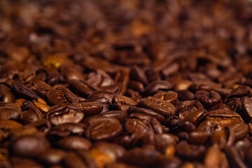 Close-up of roasted coffee beans with depth of field