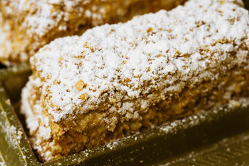 Close-up view of a sugared puff pastry.