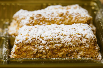 Close-up view of a sugared puff pastry.