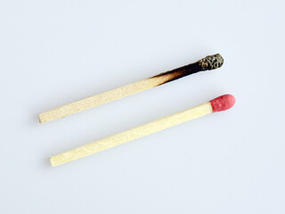 Fresh and burnt match sticks. Concept of social distancing during Covid 19 pandemic