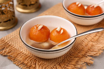 Indian sweet food Gulab jamun , gulaab jamun, jam Egyptian Zalabia balls dessert mithai freshly fried  in sugar syrup or sprinkled with powdered sugar. Prepare use milk solids on Ramadan, Diwali India