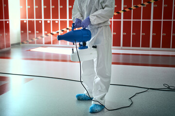 Close up of disinfection of the building corridor