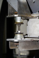 Metal screw coupling with rubber sleeve.