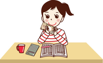 家計簿をつけ、現金をもつ若い女性。