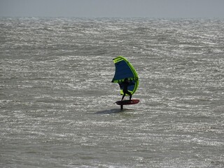 wind surfing in the sea