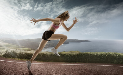 Fototapeta na wymiar Professional female runner, jogger on road and sky background. Caucasian fit athlete practicing, training excited
