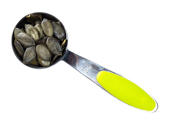 styrian pumpkin seeds in measuring spoon cutout