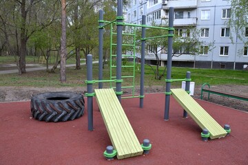 Modern playground with exercise equipment for physical activity of the population