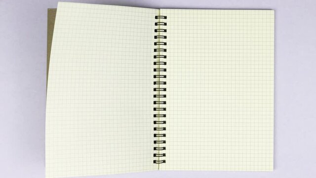 4k Stop motion graph book animation Open blank page for writing on white background